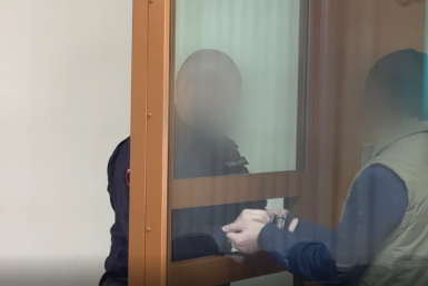 Обвиняемый в суде Кадр из видео