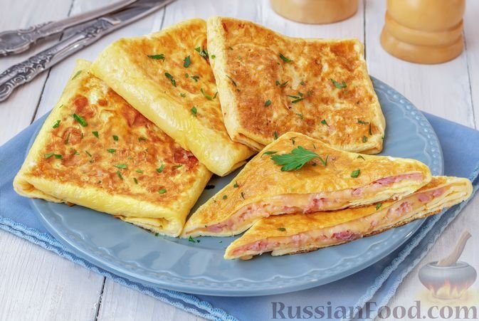 Яичные конвертики с сыром и ветчиной: накормите всю семью вкусным и сытным завтраком russianfood.com