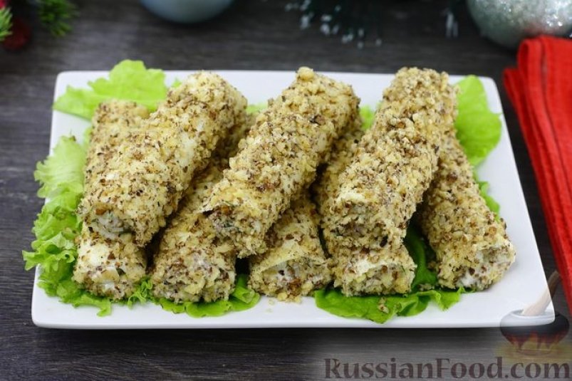 Рулетики из плавленого сыра с ветчиной и грецкими орехами russianfood.com